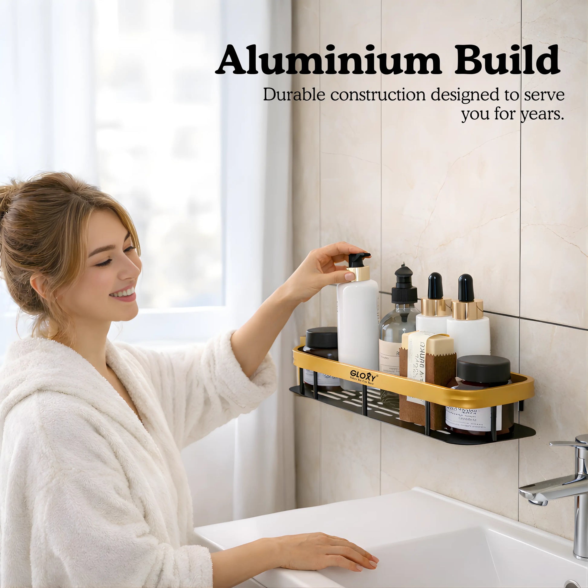 Woman using a wall-mounted shelf with skincare products in a bathroom.