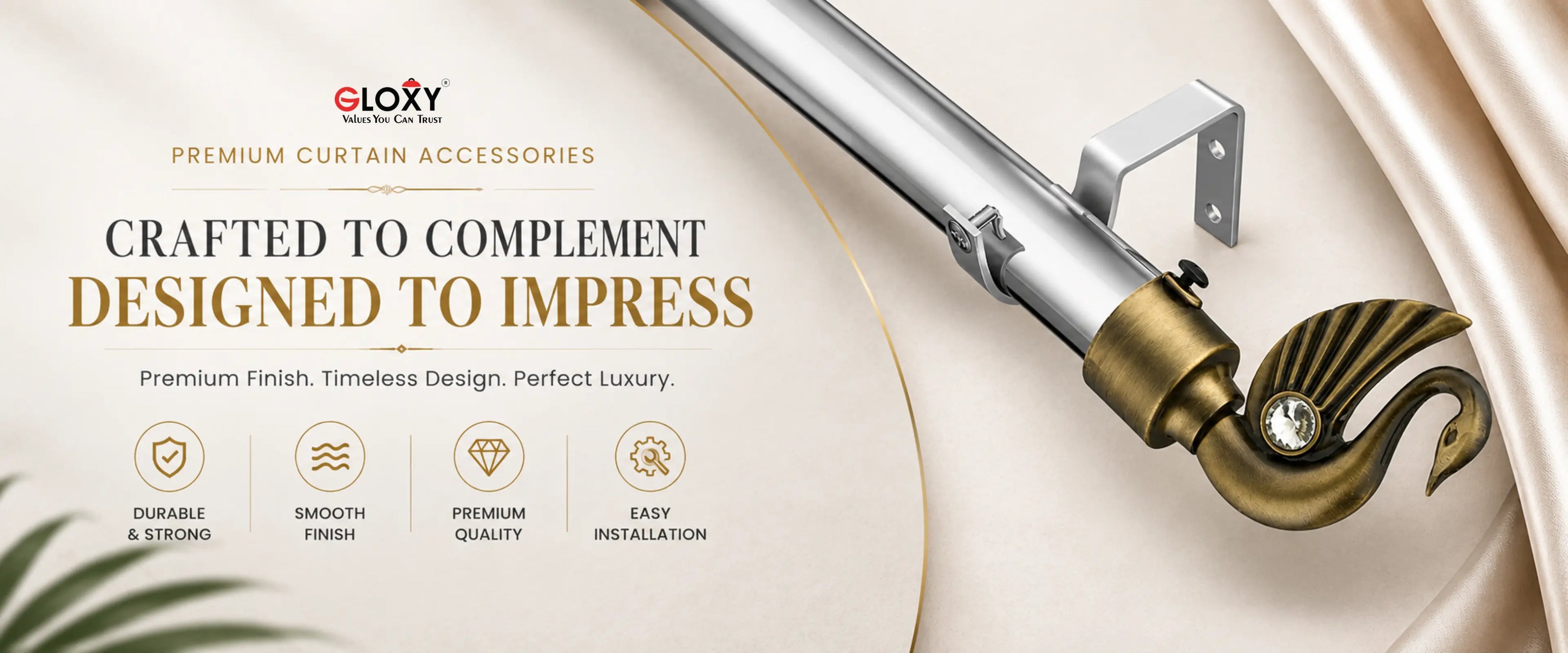 A luxury curtain rod set by Glöxy, featuring a polished silver metal rod, a decorative antique gold finial, and a silver wall mount, presented on a beige draped fabric background with promotional text.