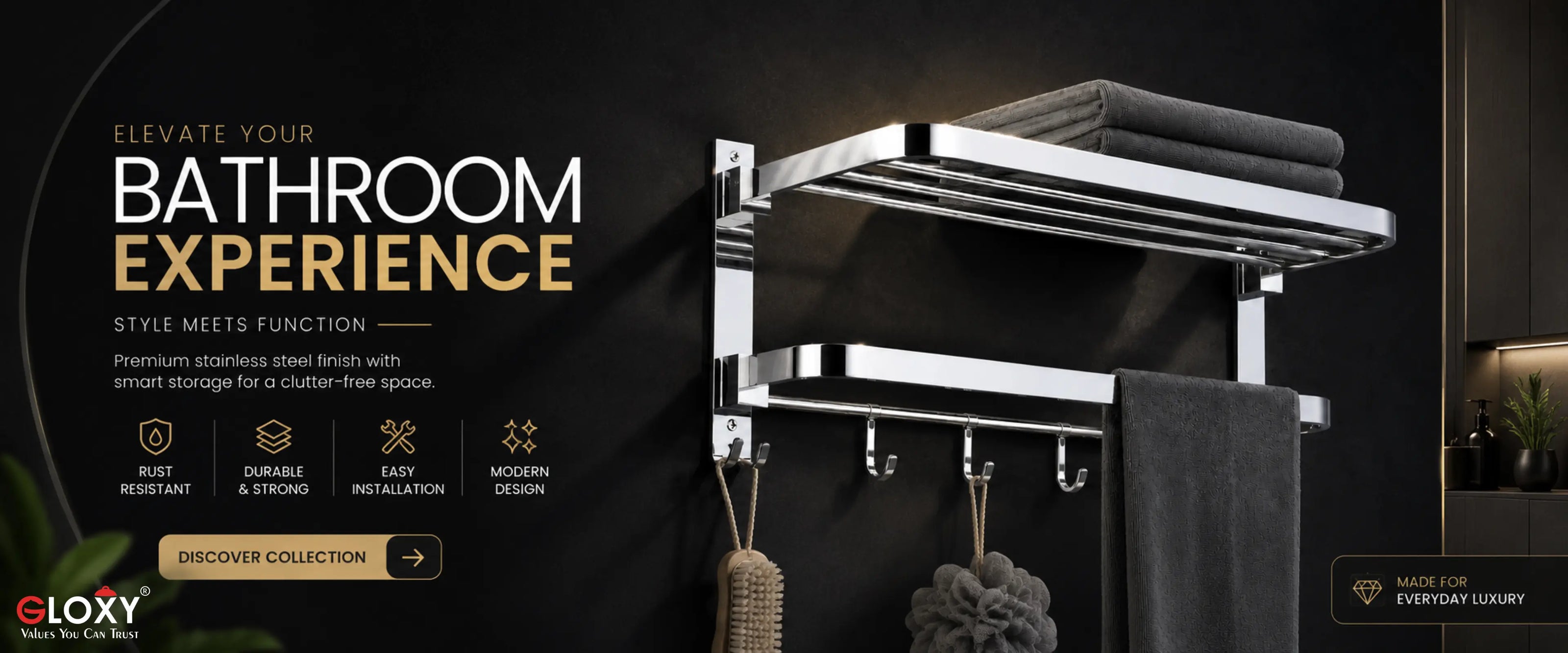 A wall-mounted double-tier stainless steel towel rack with dark gray towels, shown in a dark bathroom setting with promotional text on the left.