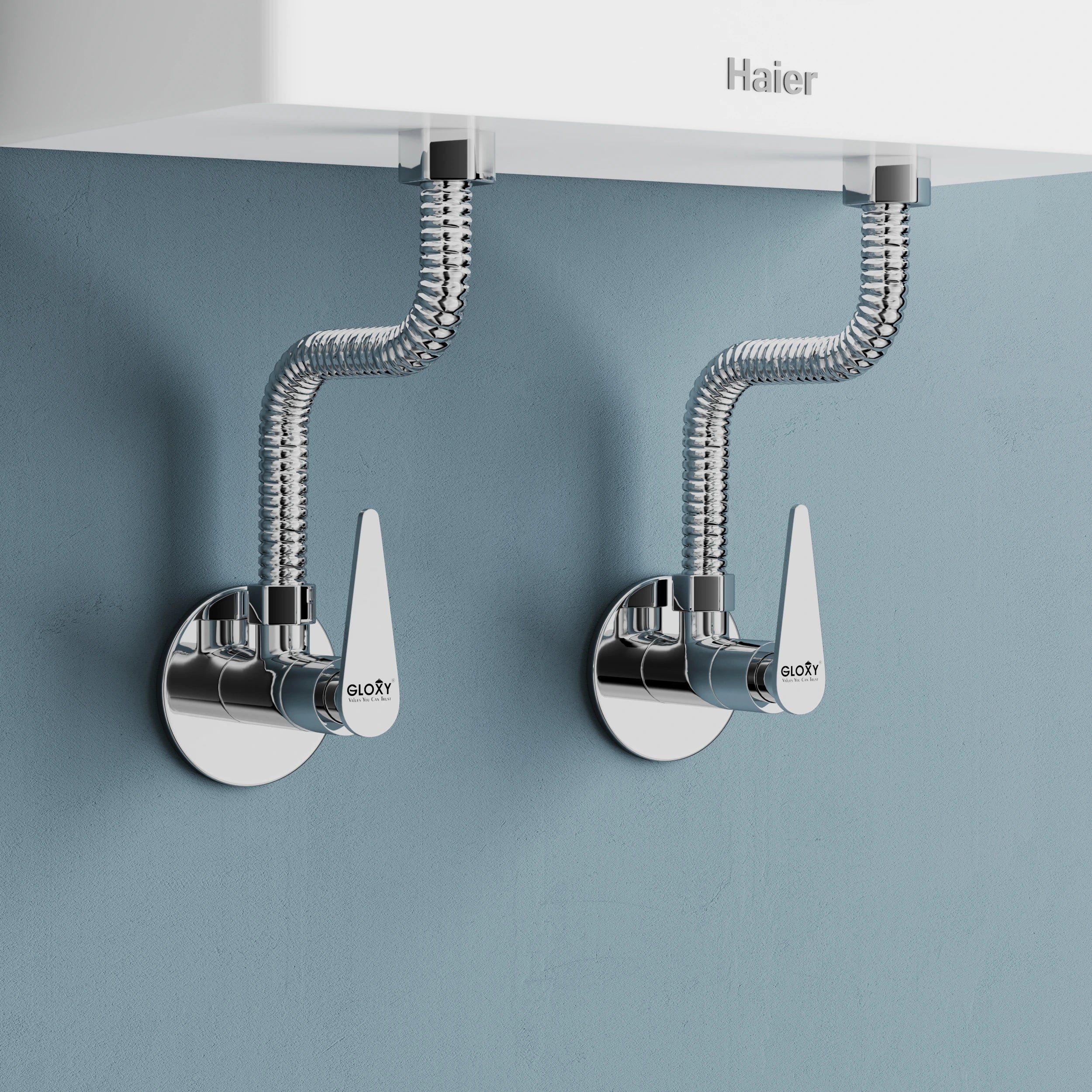 Chrome wall mount angle valbe with water heater on a blue wall.
