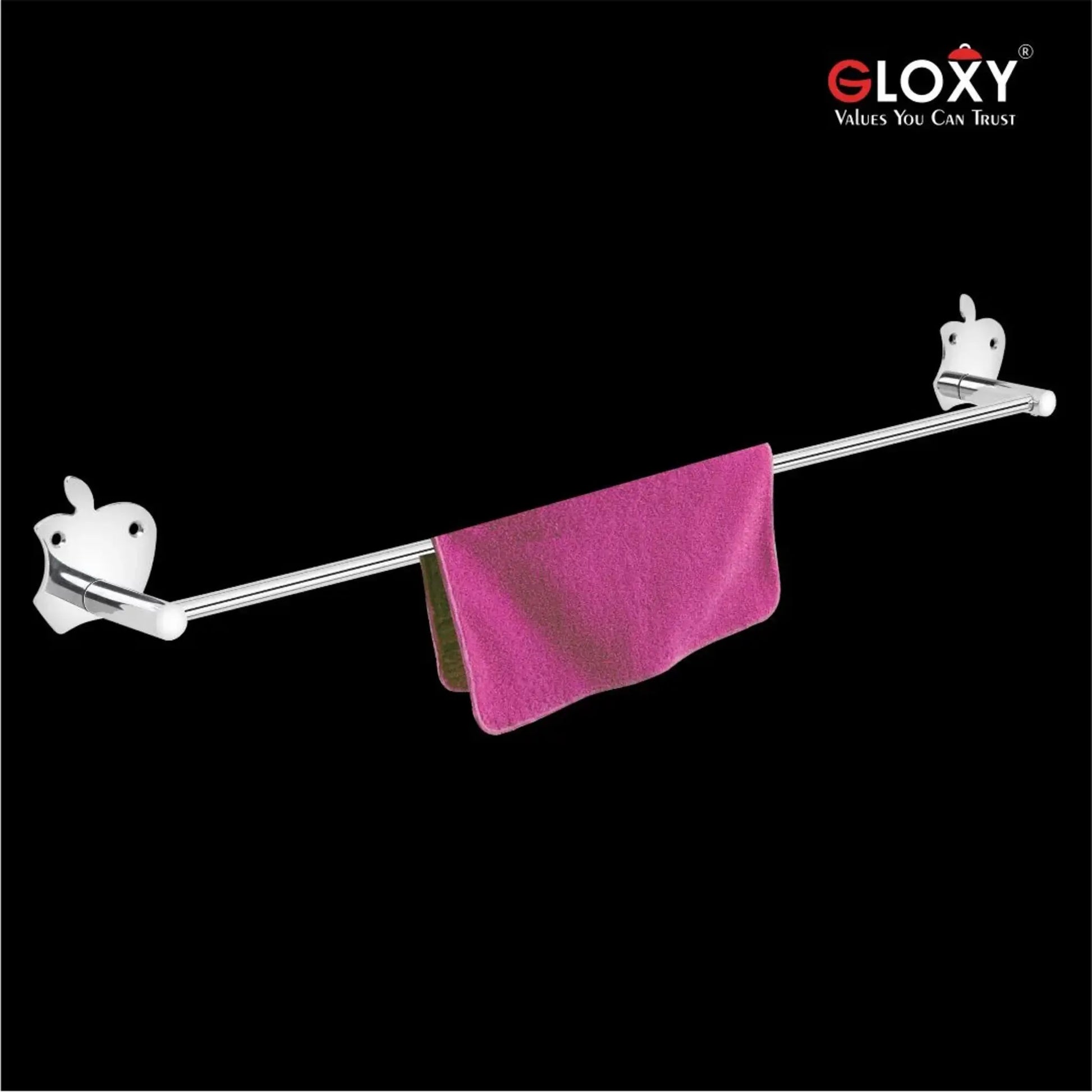 Chrome towel bar with a pink towel on a black background.
