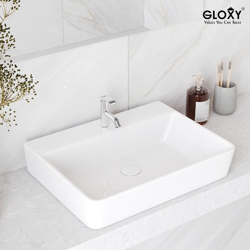 White rectangular sink with faucet in a bathroom setting, featuring the Gloxy brand.
