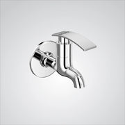 A chrome finish brass wall mount short nose faucet with a lever handle.