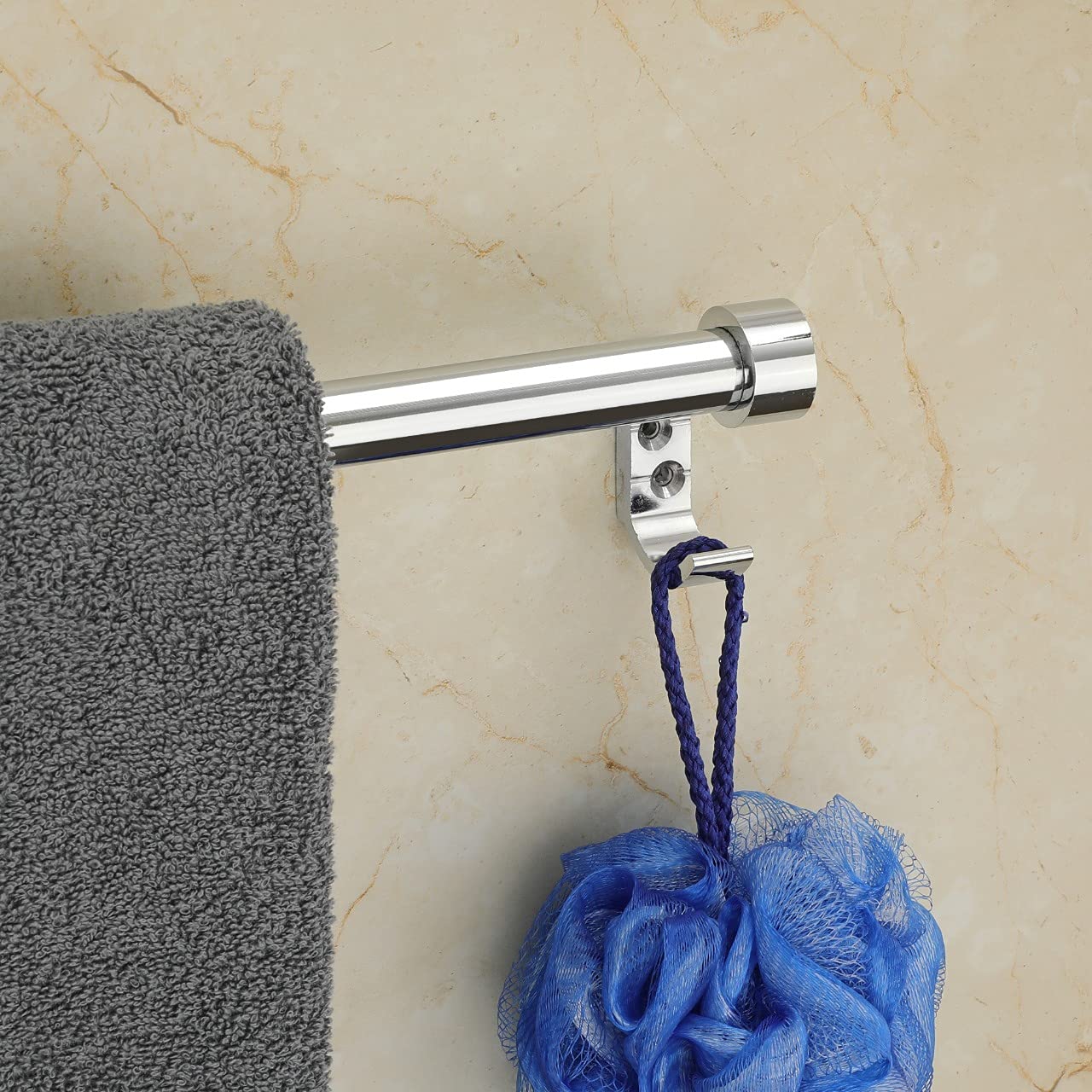 a towel bar side part view with a blue colour lofa and grey colour towel hanging on it